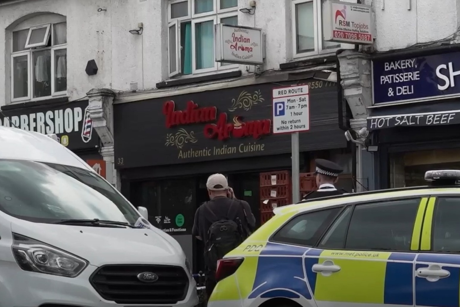 Boy, 15, and 54-year-old man arrested after fire at Ilford restaurant 